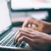 person using MacBook Pro
