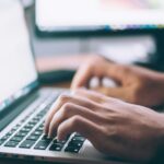 person using MacBook Pro